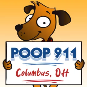 A POOP 911 Columbus pooper scooper service yard sign being held by a happy and smiling brown dog.