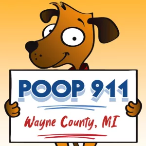 A POOP 911 Wayne County pooper scooper service yard sign being held by a happy and smiling brown dog.