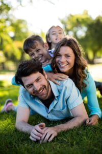 Happy POOP 911 customers enjoying the lawn without worry of pet waste